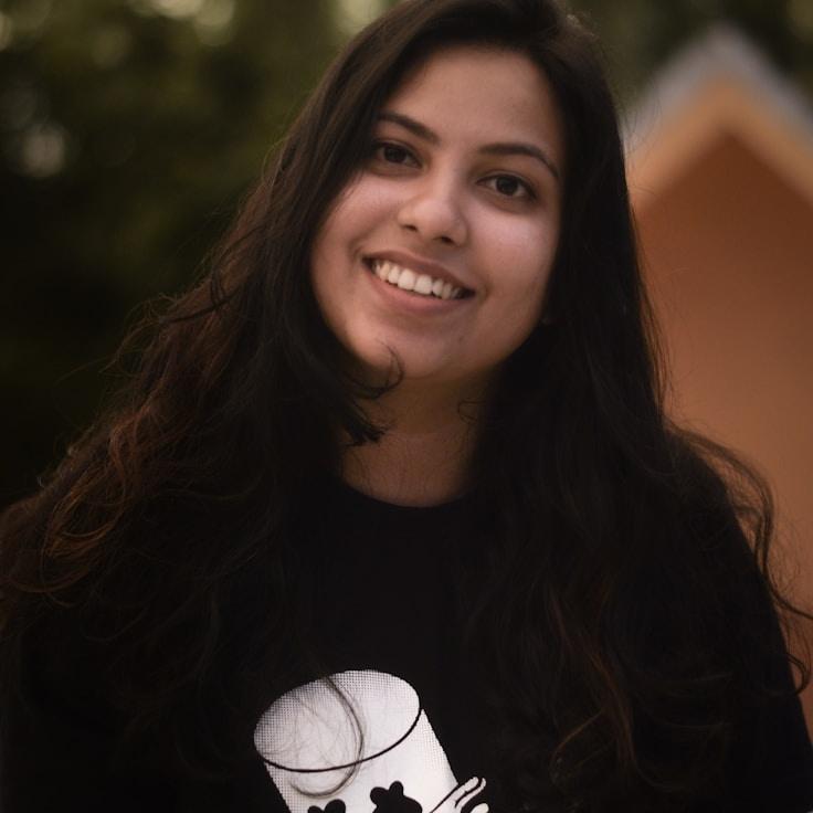 Riley Kapoor, Client Relations Director, discussing corporate gifting strategy with business clients